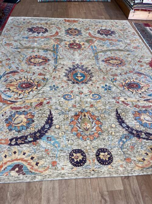 Intricate patterned vintage area rug.