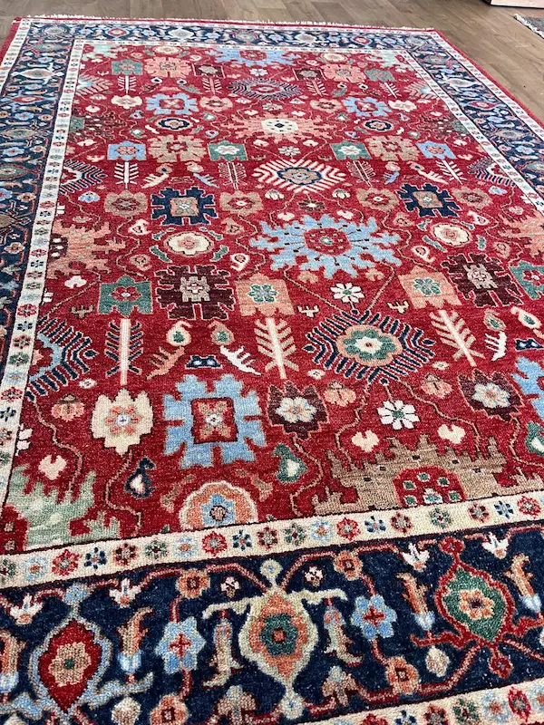 Colourful patterned traditional area rug