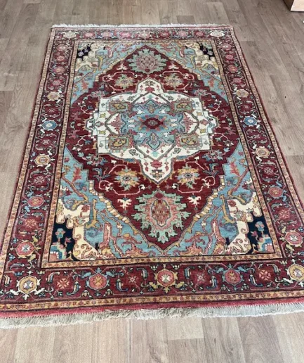 Intricate patterned traditional Persian rug.